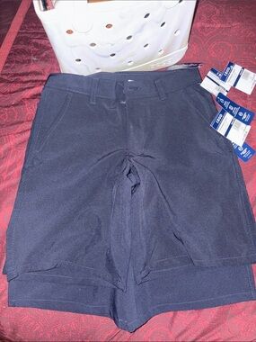4 pair of Izod Performance Uniform Shorts